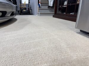 Freshly cleaned, light-colored residential carpet, showcasing the quality work of Strictly Tile & Carpet Care in Lansing, MI.