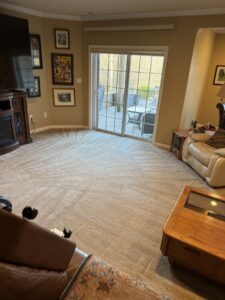 A clean residential living room carpet with fresh cleaning lines, demonstrating the work of Super Duper Carpet & Duct Cleaning in Pittsburgh, PA.