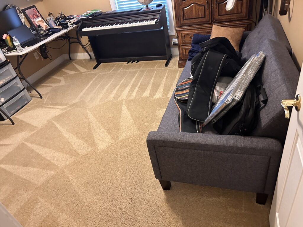 A clean beige carpet in a room showing diagonal cleaning lines from Zerorez Columbia in Columbia, SC.