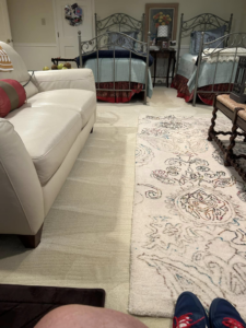 A room featuring clean, light-colored wall-to-wall carpet installed by Positively Perfect Solutions in Roswell, GA.