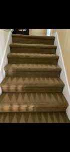 Freshly cleaned carpeted stairs with visible cleaning patterns by Scott Carpet Cleaning OC in Anaheim, CA
