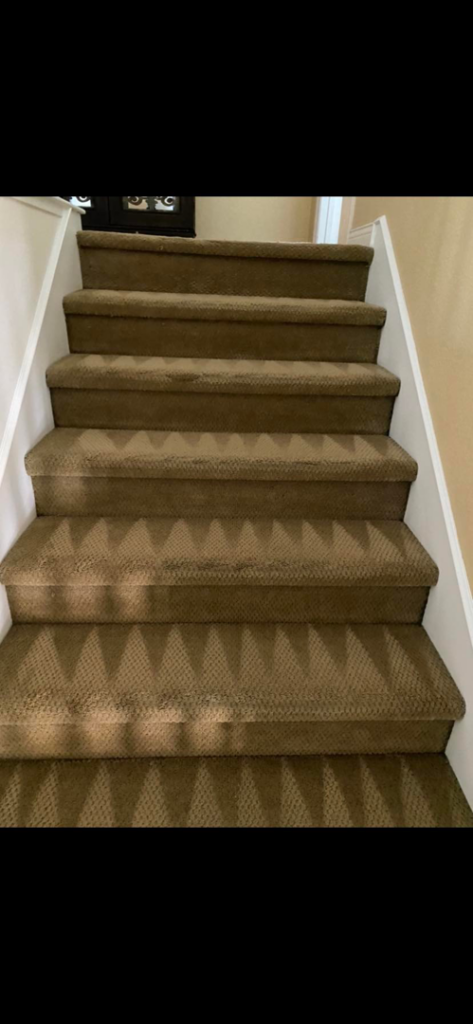 Freshly cleaned carpeted stairs with visible cleaning patterns by Scott Carpet Cleaning OC in Anaheim, CA
