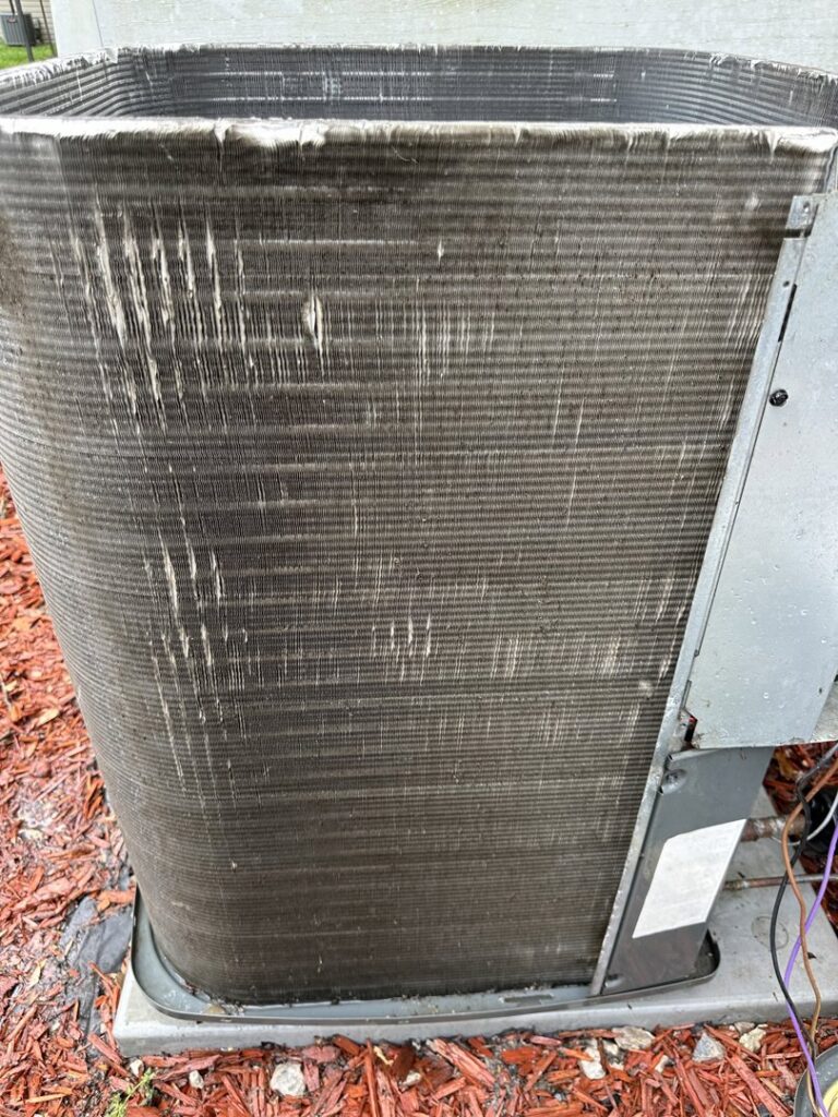 A thoroughly cleaned outdoor air conditioning coil after maintenance by Nacho Heating & Cooling Plus Co. in Crest Hill, IL