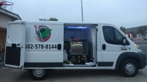 A Cleaning Service Pro, LLC van with its side door open, showcasing professional carpet cleaning equipment inside, in Peoria, AZ