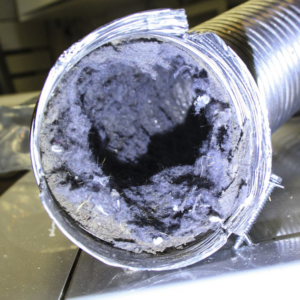 A heavily clogged flexible duct filled with lint and debris, showing the need for cleaning by Front Line Heating and Cooling in West Lafayette, IN.