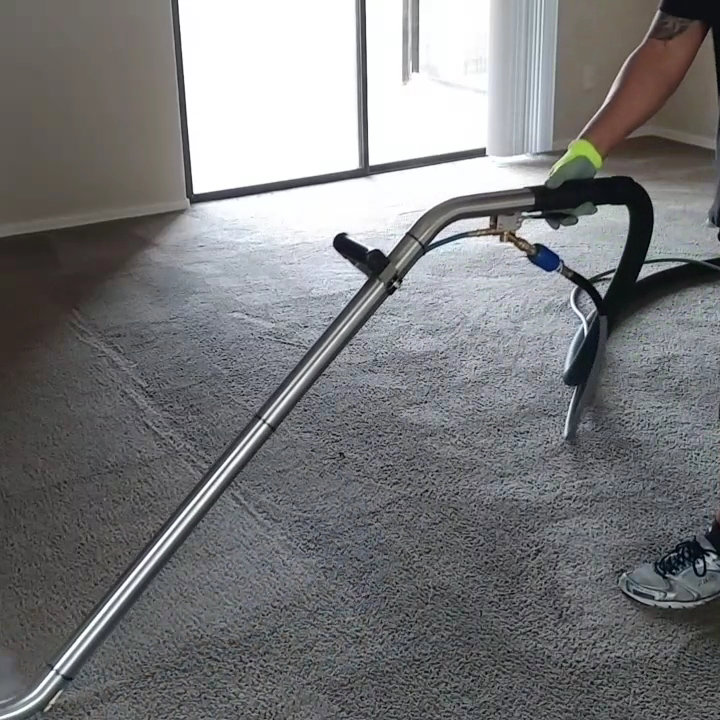 Close-up of a professional cleaning wand in action, creating cleaning lines on a carpet by Cleaning Service Pro, LLC in Peoria, AZ
