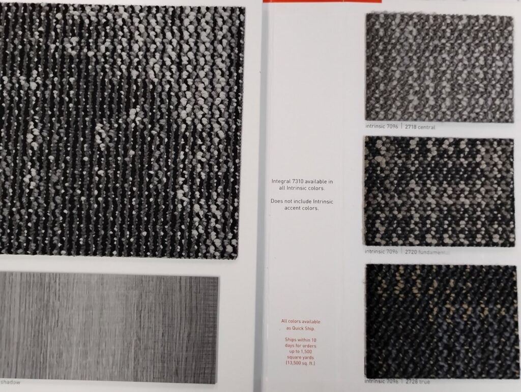 A close-up view of various carpet samples displayed in a catalog at Floors To Go in Lighthouse Point, FL