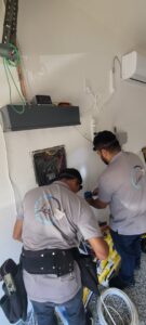 A close-up view of multiple circuit breakers, showing electrical components serviced by LeoElectricservice in Frisco, TX.