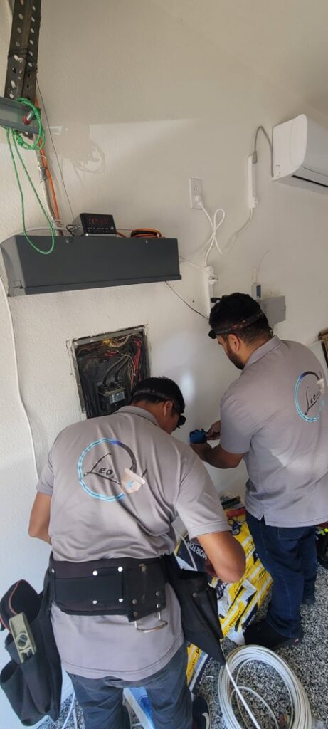 A close-up view of multiple circuit breakers, showing electrical components serviced by LeoElectricservice in Frisco, TX.