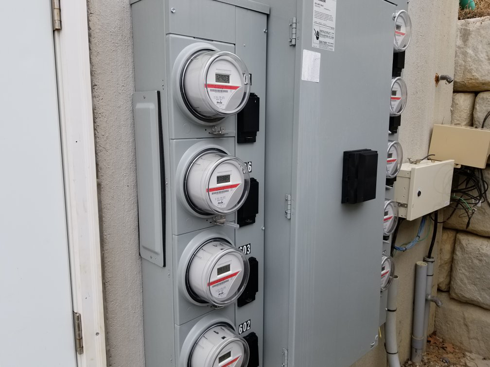 Close-up of an electric meter installation and service panel by Cargo Electric LLC in Pittsburgh, PA