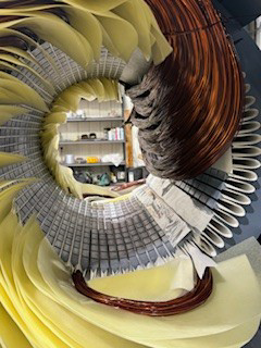 A close-up view of electric motor copper windings and insulation, serviced by Richards Electric Motor Co. in Quincy, IL