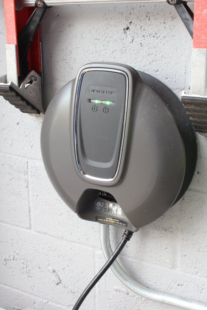 A close-up view of an electric vehicle charger installed by WireMasters Electric, Inc. in Miami, FL.