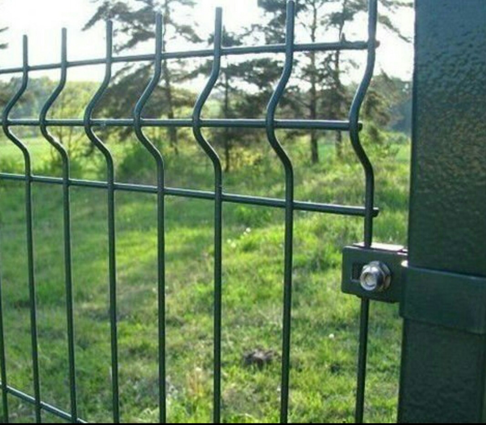 Close-up view of a newly installed green metal panel fence by Samoa Fencing in Faleata, Apia, Samoa.