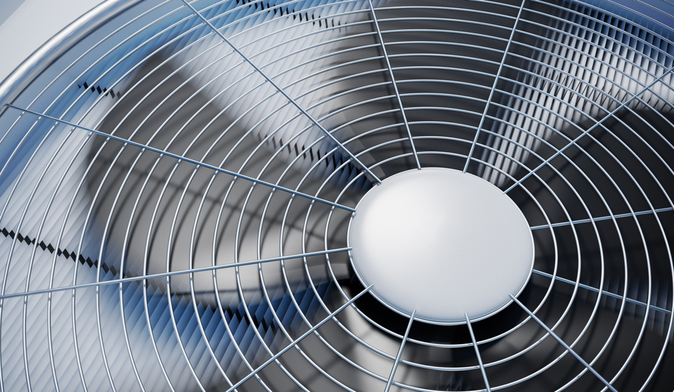 A close-up view of an outdoor HVAC air conditioning unit fan from McIntosh Heating & Cooling in Independence, MO.