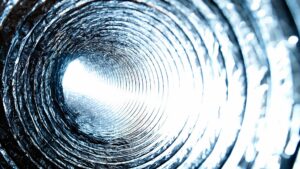 A close-up view inside flexible ductwork, representing HVAC system components from Mid-City HVAC, INC. in Chicago, IL.