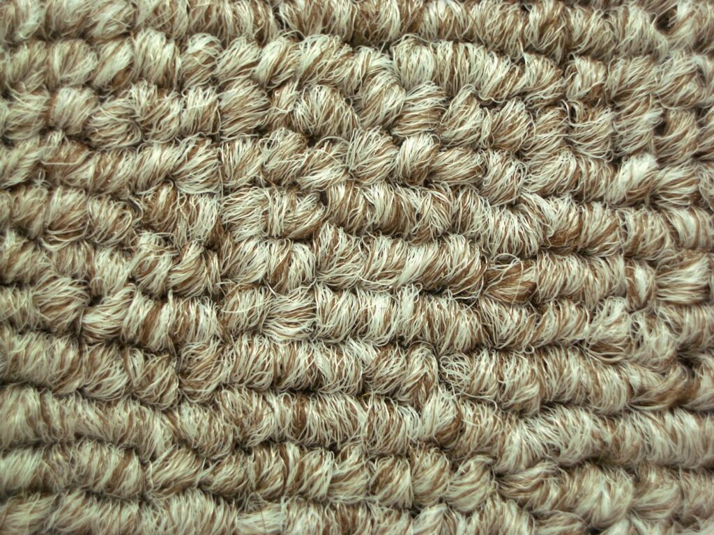 An intricate close-up of a soft, looped carpet texture, offered by Home Dynamics Flooring LLC in Harrisburg, SD.