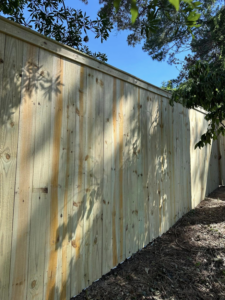 Close-up view of new wood fence panels installed by First in Fencing and Remodeling in Fayetteville, NC.