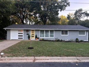 A close-up view of a garage door spring mechanism, a common repair or installation by Overhead Door Company of Central Missouri in Columbia, MO.