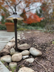 A close-up view of an outdoor path light installed by K E Troutman Electrical Contractor in Newark, DE.