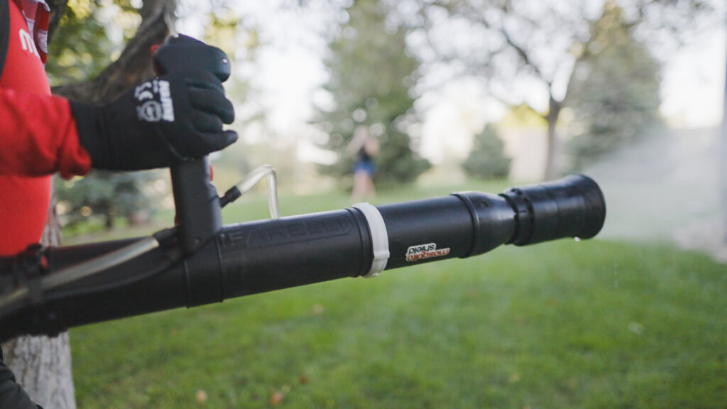 A close-up of a Mosquito Shield sprayer emitting mist during a pest control job in Downtown Atlanta, GA.