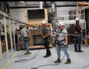 A close-up view of a clean stone fireplace insert, ready for use by Chimney Mechanix of Indiana in Lafayette, IN.