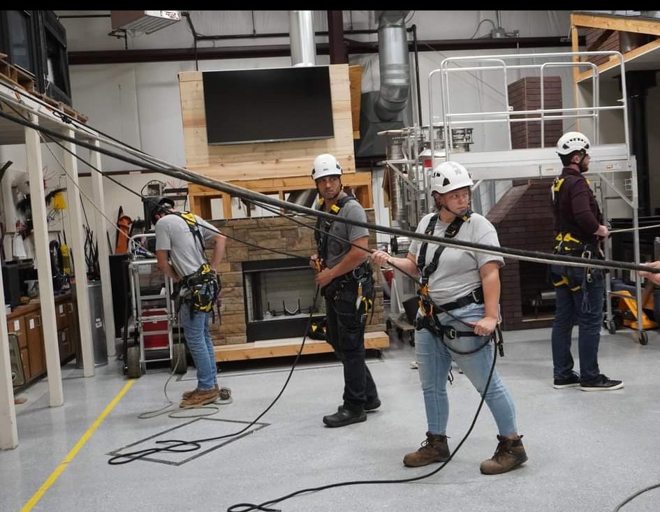 A close-up view of a clean stone fireplace insert, ready for use by Chimney Mechanix of Indiana in Lafayette, IN.