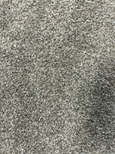 A close-up view of a warm tan carpet texture installed by Lakefront Flooring in Erie, PA.