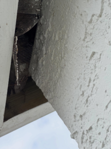 Close-up of wildlife exclusion mesh installed on a building opening by Ultra Pest in Mt. Pleasant, SC