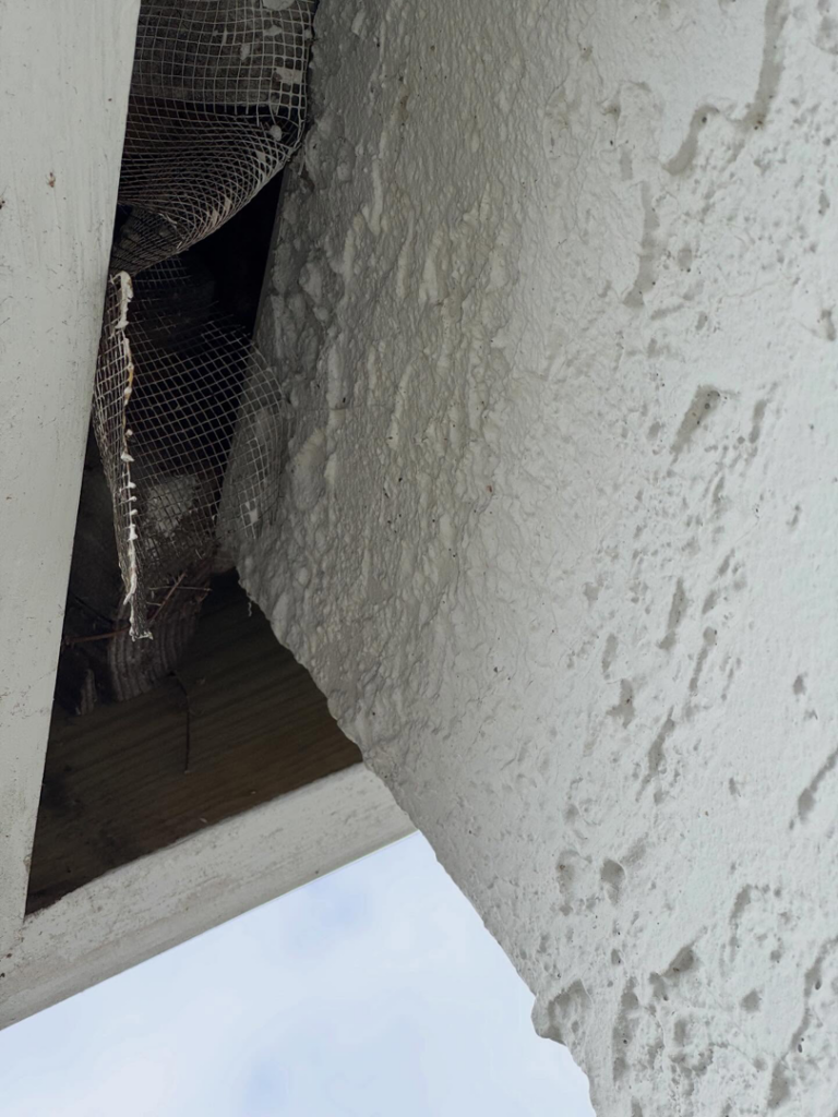 Close-up of wildlife exclusion mesh installed on a building opening by Ultra Pest in Mt. Pleasant, SC