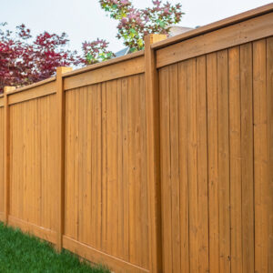 A close-up view of a sturdy wooden privacy fence, a quality installation by Top Rail Fence Des Moines in West Des Moines, IA.
