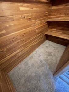 A closet with new gray carpet installed by Flooring World Wide LLC in Plainwell, MI.