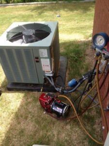 A cluttered garage or storage area needing general junk removal by Climate Control, LLC in Albany, GA.