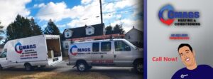 CMAGS HVAC INC service vans parked at a residential job site in Warwick, RI, ready for heating or cooling work.