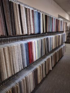 Rows of colorful carpet samples displayed for selection by The Flooring Source, a carpet contractor in St. Louis, MO.