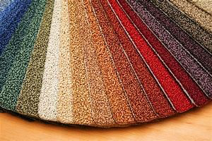 A vibrant fan of colorful carpet samples offered by Northwest Carpet Company in Anchorage, AK