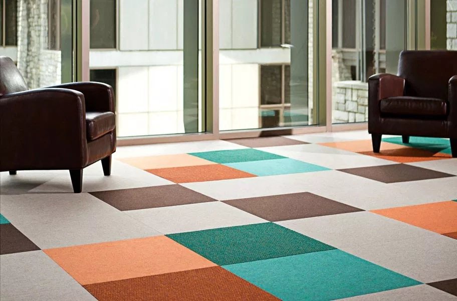 Modern colorful carpet tile design in a commercial space by CAP Flooring in Buffalo, NY
