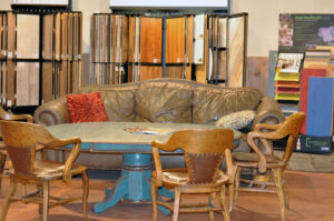 A comfortable carpeted seating area in the showroom at Warehouse Flooring in Great Falls, MT