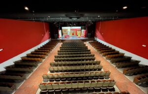 Completed commercial carpet installation in an auditorium by Global Flooring Enterprise in Miami, FL.