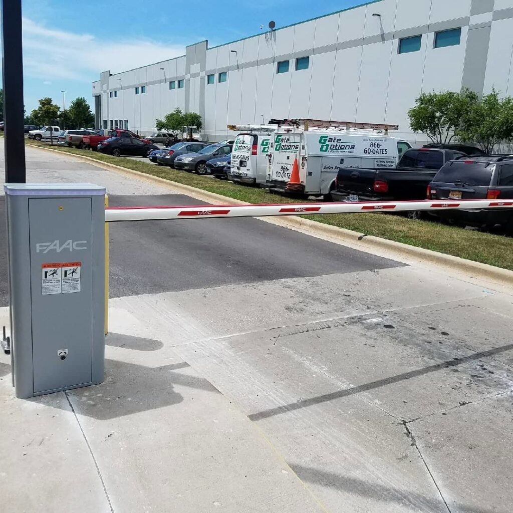 Commercial barrier gate installation with a Gate Options service van in West Chicago, IL