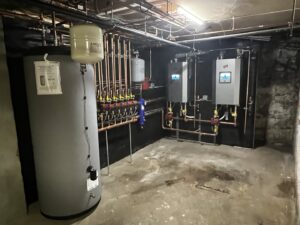 A complex installation of multiple commercial boilers and copper piping by All Points HVAC in Worcester, MA.