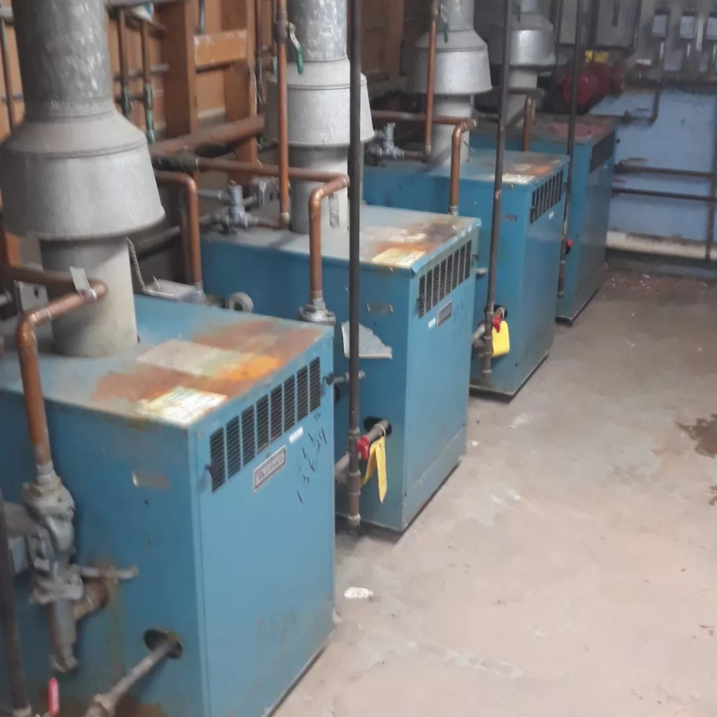 A row of commercial boilers installed by W.N. Heating & Cooling, Inc in Worth, IL