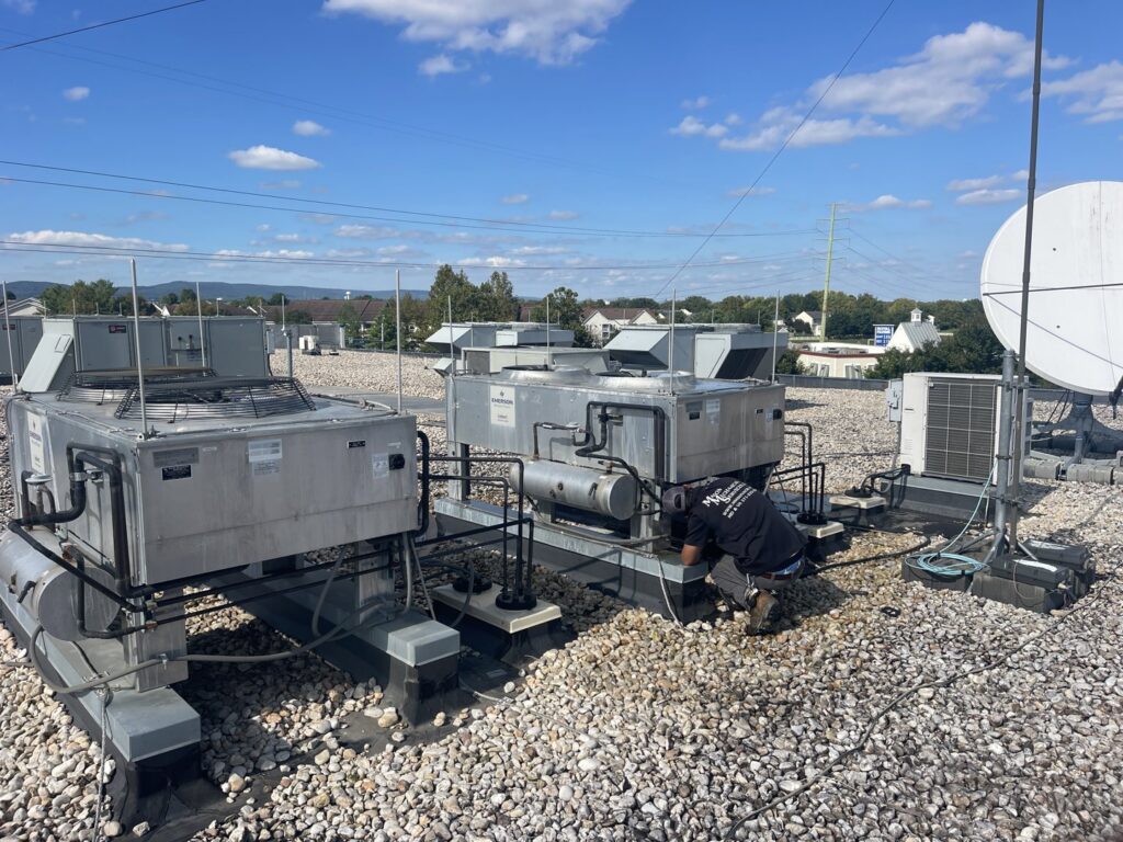 A large commercial Bryan Boilers heating system in a utility room by Mason Mechanical Services LLC HVAC Frederick Md in Jefferson, MD.