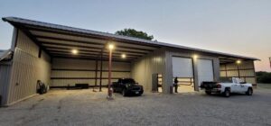 Exterior lighting illuminating a commercial metal building, installed by AVA Electric, LLC in Fort Worth, TX.