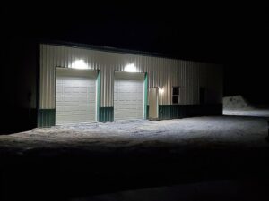 Commercial building exterior illuminated by bright outdoor lighting installed by Innovative Electric in Wichita, KS.
