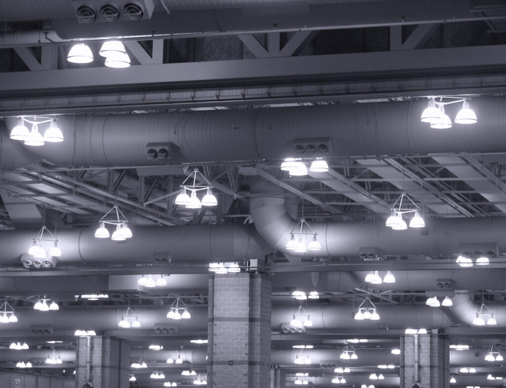 Bright overhead lighting installed in a large commercial building by LMS Energy in Milwaukee, WI.