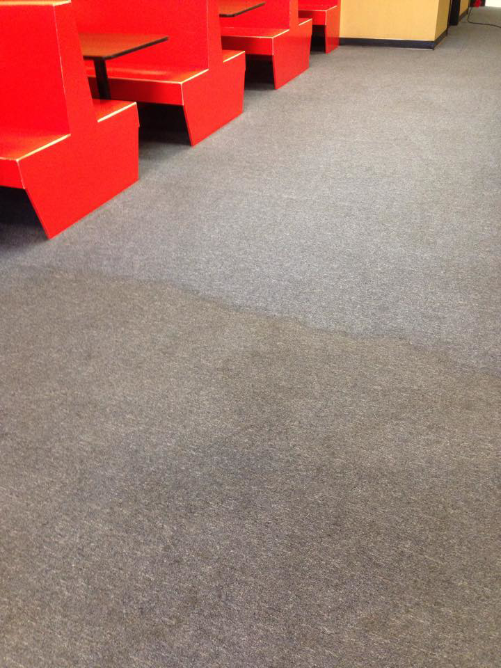A commercial carpet showing a before and after cleaning section by Capital City Cleaning & Restoration in Columbia, SC