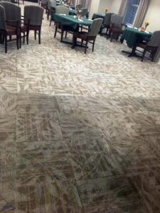 Before and after view of commercial carpet cleaning by Captain Steamer in Cape Coral, FL.
