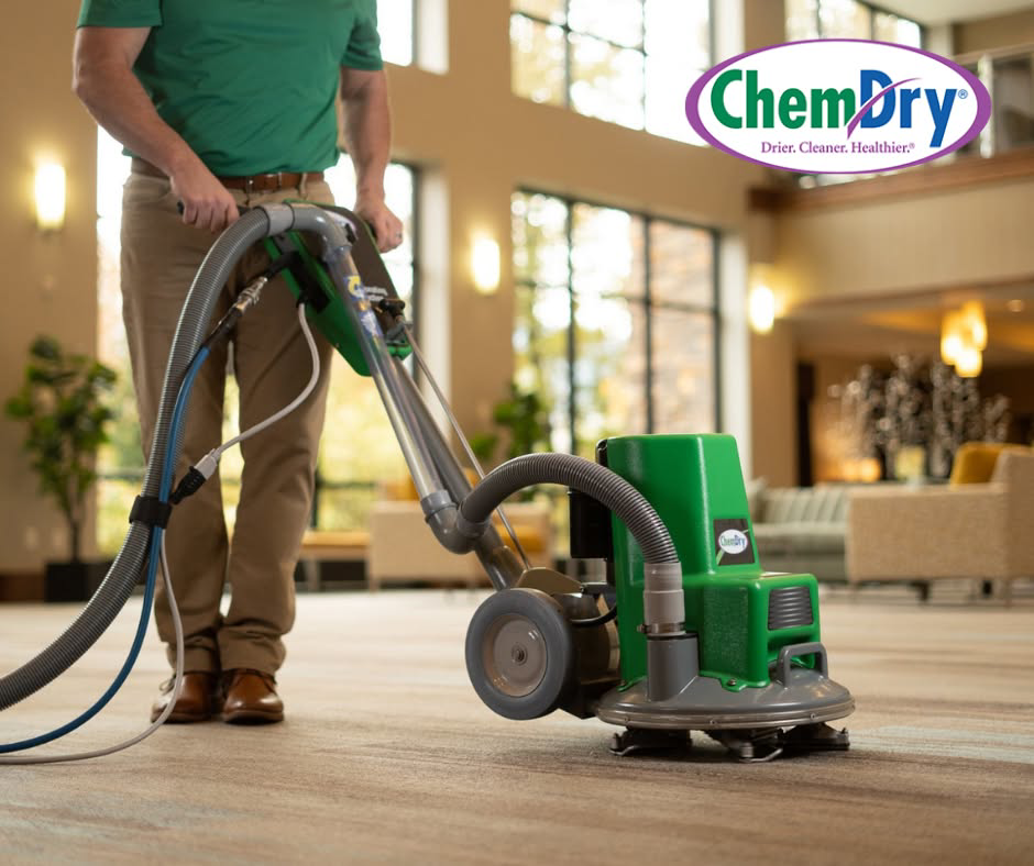 A Chem-Dry technician performing commercial carpet cleaning in a large lobby in Alexandria, VA.