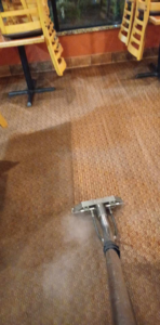 Commercial carpet cleaning in progress at a business by Professional Carpet Systems of Raleigh, NC