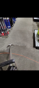 A professional commercial carpet cleaning service in progress by Just Floors in Orlando, FL.